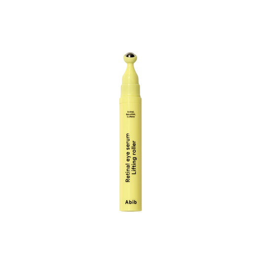 ABIB Retinal Eye Serum Lifting Roller is a lightweight eye treatment designed to help smooth fine lines, reduce puffiness, and improve the appearance of dark circles. Enriched with Retinal and Bakuchiol, it supports skin elasticity and helps refine texture for a firmer look. Caffeine helps visibly reduce puffiness, while Ceramide, Ectoin, and Collagen help protect and strengthen the skin barrier. The cooling roller applicator provides a gentle massage to enhance absorption and leave the eye area feeling ref