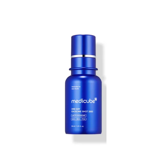 MEDICUBE One Day Exosome Shot Pore Ampoule 2000 is crafted to refine pores and smooth skin texture. This ampoule features Niacinamide and Milk Exosomes to balance oil production and minimize pores. Ingredients like Evening Primrose and Pine Leaf provide elasticity and antioxidant benefits. Panthenol and Adenosine soothe and repair, making this ideal for daily use in achieving a clearer, refined complexion. Suitable for anyone targeting pore concerns.